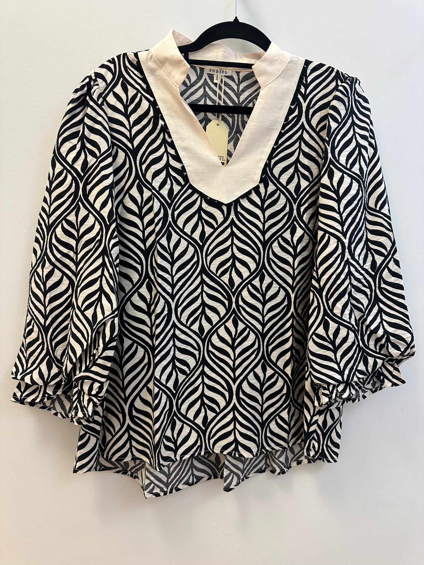 black and white moment top